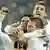 Michael Ballack feiert sein Tor zum 2:0 mit Bastian Schweinsteiger und Miroslav Klose