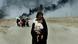 Irak Frau mit Kind flieht aus Basra Irak Frau mit Kind flieht aus Basra
