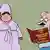Карикатура: Полная женщина в халате и бигудях со сковородкой в руке стоит рядом с щуплым мужчиной. Он замахивается одной рукой, а в другой держит книгу, в которую смотрит, с названием "Дума РФ. Домашнее насилие. Теория и практика".