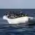 Біженці перетинають Середземне море на переповненому човні