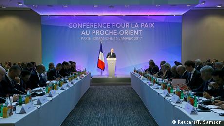 French Foriegn minister Jean-Marc Ayrault speaks onstage at the 2017 Paris summit (Reuters/T. Samson)