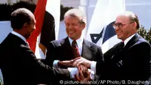 Washington 1979 Sadat, Carter und Begin ägyptisch-israelischer Friedensvertrag in Washington 1979 (picture-alliance/AP Photo/B. Daugherty)