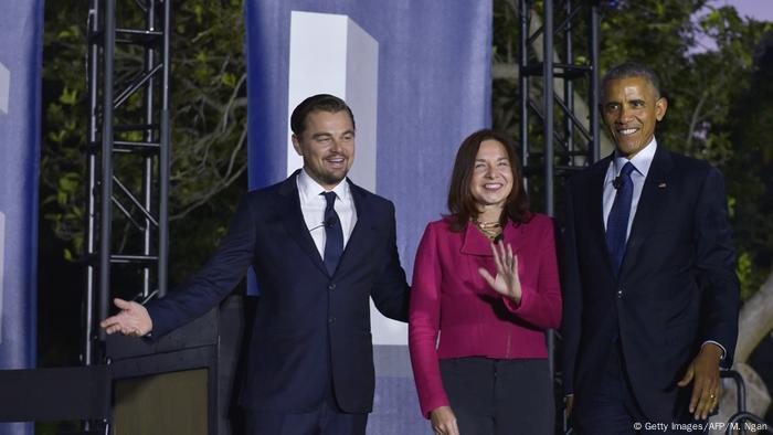 Climate scientist Katharine Hayhoe with Leonardo DiCaprio and Barack Obama (Getty Images/AFP/M. Ngan)