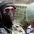 Elfenbeinküste Vermummter Soldat in Bouake