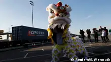18.01.2017++++ Performers dance during a welcoming ceremony to mark the inaugural trip for the first freight train to travel from China to Britain at at Barking Intermodal Terminal near London near London, Britain January 18, 2017. REUTERS/Stefan Wermuth