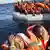 Лодки с беженцами в Средиземном море