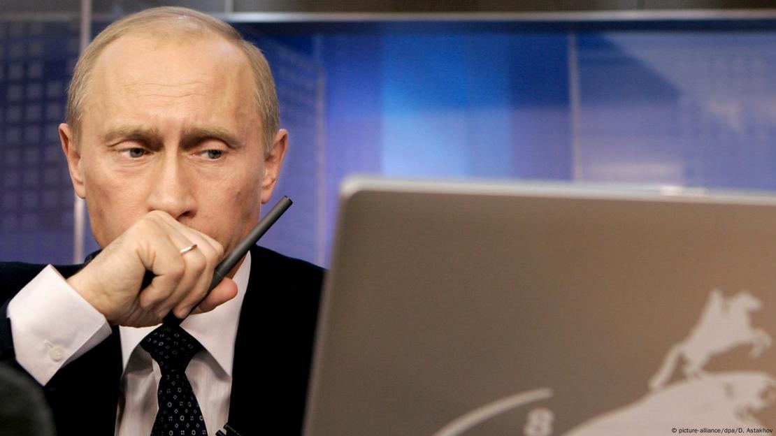 Vladimir Putin with a laptop