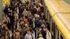 Commuters at the Alexanderplatz train station in Berlin Commuters at the Alexanderplatz train station in Berlin