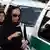 صحنه‌ای از کنترل پوشش زنان در خیابان‌های تهران
