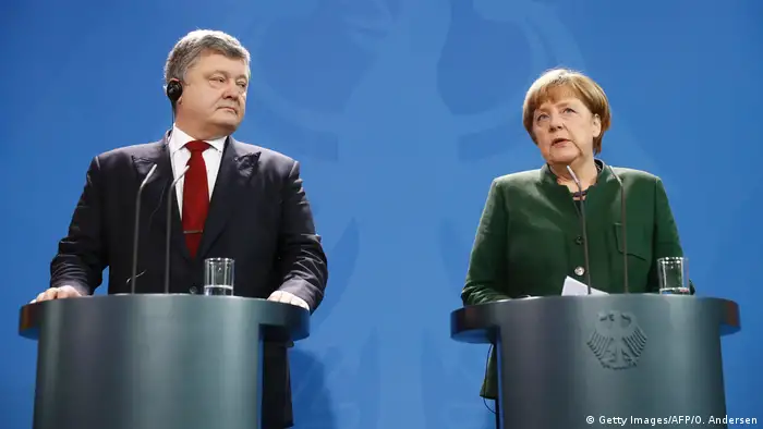 Deutschland - Angela Merkel und der ukrainische Präsident Petro Poroshenko (Getty Images/AFP/O. Andersen)