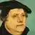 A painting of Martin Luther wearing a floppy hat.