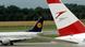 Tailfins of Austrian Airlines and Lufthansa jets Tailfins of Austrian Airlines and Lufthansa jets