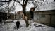 The aftermath of shelling in a residential area in eastern Ukraine The aftermath of shelling in a residential area in eastern Ukraine