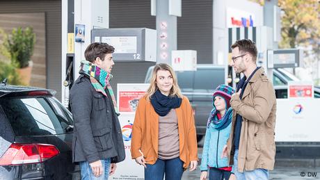 At the gas station, Lisa and Emma happen to meet their friend Max.