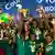 Cameroon's Benjamin Moukandjo celebrates with the trophy and teammates after winning the African Cup of Nations