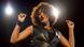 Singer Whitney Houston seen here performing while snapping her fingers Singer Whitney Houston seen here performing while snapping her fingers