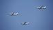 Chinese aircraft fly during a commemoration ceremony Chinese aircraft fly during a commemoration ceremony
