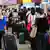Passengers at Tegel airport queue