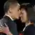 President-elect Barack Obama, left, kisses his wife Michelle Obama after addressing supporters at the election night rally in Chicago, Tuesday, Nov. 4, 2008. (AP Photo/Jae C. Hong)