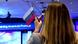 A lady holds the Russian flag with the word Trump on it at CPAC2017 A lady holds the Russian flag with the word Trump on it at CPAC2017