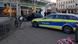 Carro da polícia diante do automóvel que atropelou pedestres em Heidelberg Carro da polícia diante do automóvel que atropelou pedestres em Heidelberg