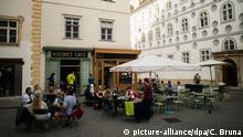 epa05564272 General view of the 'Kleines Cafe', a traditional coffee house ('Kaffeehaus'), in Vienna, Austria, 30 September 2016. The Viennese coffee house culture (Wiener Kaffeehauskultur) has played an important part in shaping Austrian culture. Coffee houses were used as a venue for famous literary figures and artists particularly in the 19th century. In 2011, Viennese coffee house culture was included by the UNESCO in the national inventory of intangible cultural heritage. International Coffee Day is celebrated on 01 October. EPA/CHRISTIAN BRUNA |