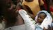 A Ghanaian mother with her baby A Ghanaian mother with her baby
