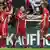 Bayern-Spieler klatschen sich ab. Foto: dpa-pa