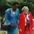 Rose Kabuye walks with US Secretary of State Madeleine Albright in 1997