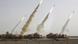 Iranian rocket testing showing rockets shooting into the air Iranian rocket testing showing rockets shooting into the air