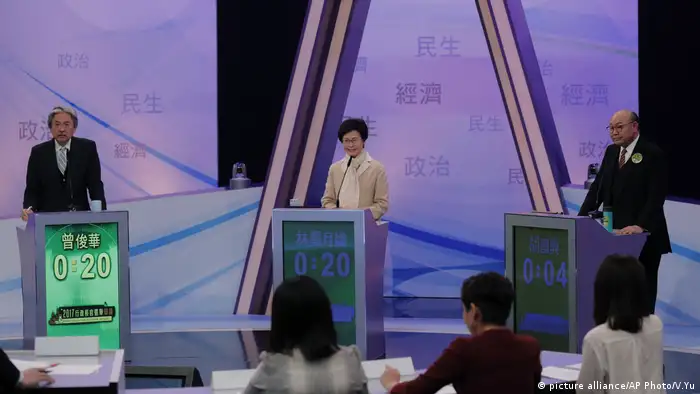 Carrie Lam, John Tsang Chun-wah, Woo Kwok-hing Executive Debatte (picture alliance/AP Photo/V.Yu)