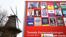 14.03.2017+++ An election poster billboard seen near a windmill the day before a general election, in Amsterdam, Netherlands, March 14, 2017. REUTERS/Michael Kooren 