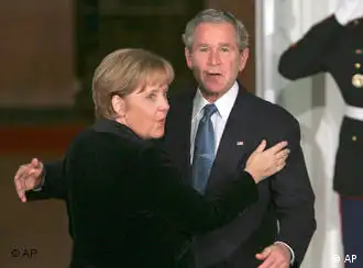 出席华盛顿国际金融峰会的德总理默克尔同美总统布什