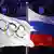 Олимпийский и российский флаги