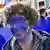 Девушка с раскрашенным в цвета ЕС лицом на митинге Pulse of Europe 
