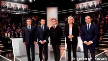 Le Pen y Macron se enfrentan por burkini en debate de TV en Francia