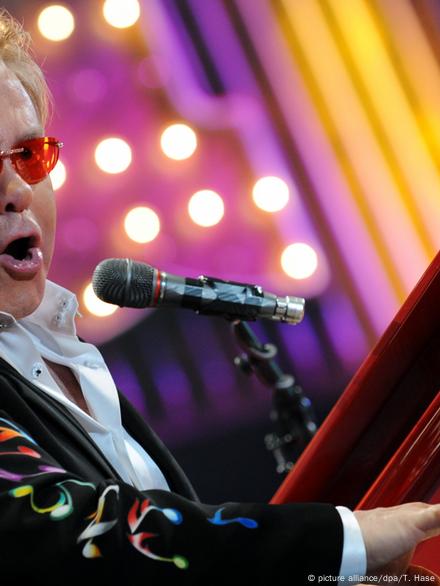 Coolest Dad and Child Costume: Elton John and Piano