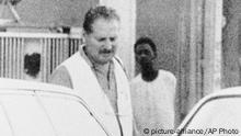 FILE- August 1994 file of Carlos The Jackal walking in the streets of Khartoum, Sudan. Carlos, whose real name is Ilich Ramirez Sanchez, the flamboyant terrorist and self-proclaimed revolutionary who was once one of the Cold War's most wanted men, is appealing Monday May 13, 2013 his two life sentences for orchestrating bombings in France two decades ago. He's been jailed since 1994 after French agents seized him in Sudan. (AP Photo/File) |