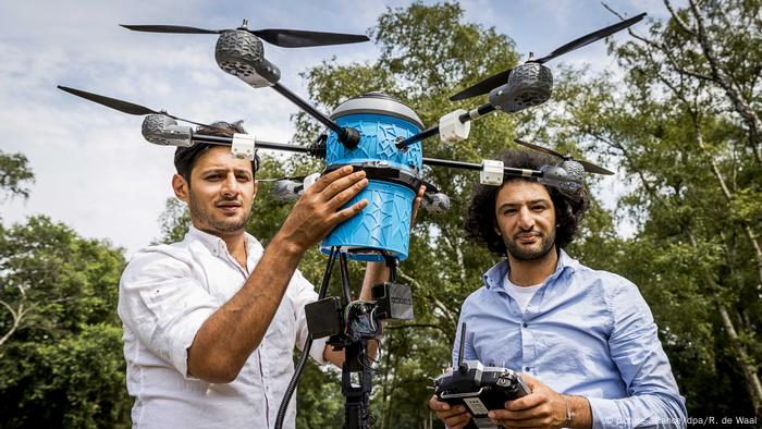 Two men with a drone