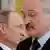 Russian President Vladimir Putin and Belarus' President Alexander Lukashenko looking in opposite directions at a news conference after talks in 2017