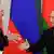 Russian President Vladimir Putin, right, and Belarus' President Alexander Lukashenko shakes hands