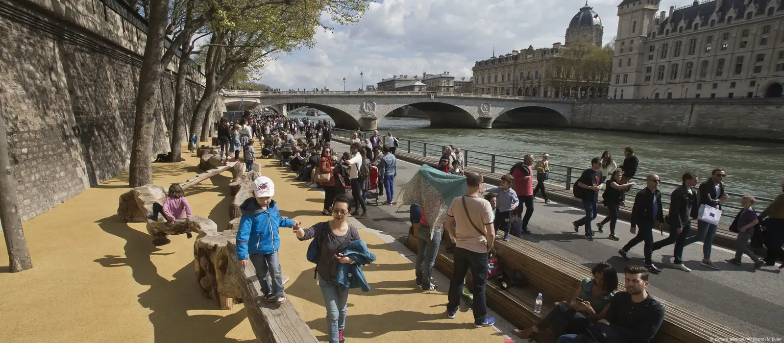 Paris, France - July 2, 2017: tourists walk on the most famous