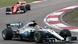 Der britische Mercedes-Pilot Lewis Hamilton (r.) fährt vor dem deutschen Ferrari-Rennfahrer Sebastian Vettel (l.) beim Grand Prix in China (Foto: picture-alliance/AP Photo/T. Takahashi) Der britische Mercedes-Pilot Lewis Hamilton (r.) fährt vor dem deutschen Ferrari-Rennfahrer Sebastian Vettel (l.) beim Grand Prix in China (Foto: picture-alliance/AP Photo/T. Takahashi)
