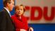 Chancellor Merkel sanding in front of a CDU logo with CDU General Secretary Ronald Pofalla Chancellor Merkel sanding in front of a CDU logo with CDU General Secretary Ronald Pofalla