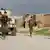 Афганские военные в районе военной базы недалеко от Мазари-Шарифа