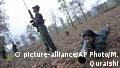 13.04.2007
FILE - In this April 13, 2007 file photo, Maoist rebels or Naxalites, officially the Communist Party of India (Maoist) that takes its name from the Naxalbari, a village outside Kolkata where the revolt began in 1967, exercise at a temporary base in the Abujh Marh forests, in the central Indian state of Chattisgarh. Rebels inspired by Chinese revolutionary leader Mao Zedong have been fighting since the late 1960s, staging hit-and-run attacks against Indian authorities. They demand a greater share of wealth from the area's natural resources and more jobs for farmers and the poor. (AP Photo/Mustafa Quraishi, File) |