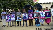 Bangladeshi activists hold the photos of activists, writers and bloggers (L-R) Niloy Neel, Humayun Azad, Ananta Bijoy Das, Avijit Roy, Faisal Arefin Dipan, Nazimuddin Samad, Ahmed Rajib Haider and Oyasiqur Rhaman) who were murdered by unidentified assassins in the last few years, in Dhaka on June 15, 2016.
Secular activists protest the recent murder of online activist, blogger, publisher and writers that have been claimed by Islamic extremists.
/ AFP / STR (Photo credit should read STR/AFP/Getty Images)
