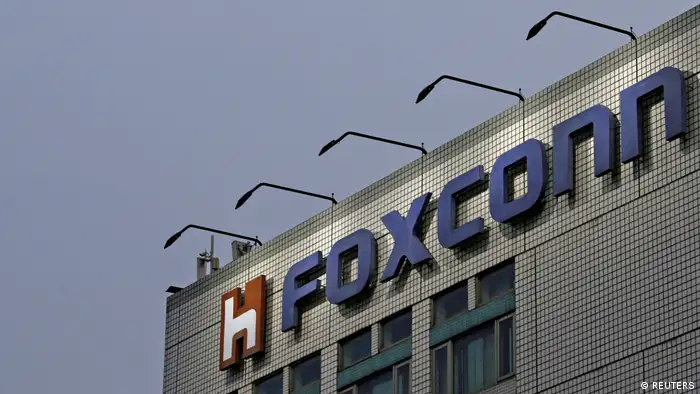 FILE PHOTO: The logo of Foxconn, the trading name of Hon Hai Precision Industry, is seen on top of the company's headquarters in New Taipei City, Taiwan