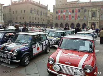 A view of Piazza Maggiore in Bologna, central Italy, during the annual Italian Job Mini Cooper charity meeting Sunday October 29, 2000. 93 Minis from England, Scotland, Ireland, Canada, New Zealand, Holland and Italy, took part in the 2000 edition. (AP Photo/Paolo Ferrari)