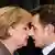 Nicolas Sarkozy und Angela Merkel (Quelle: AP)